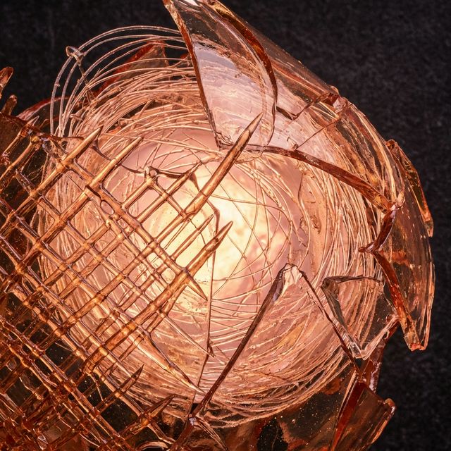 Spun sugar glass structure glowing with warmth